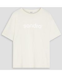 Sandro - T-shirt aus baumwoll-jersey mit logoprint - Lyst