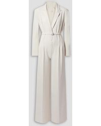 Norma Kamali - Belted Pleated Stretch-jersey Wide-leg Jumpsuit - Lyst