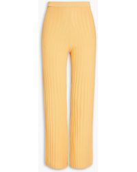 Sandro - Ribbed-knit Flared Pants - Lyst