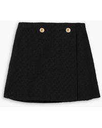 Versace - Wrap-effect Button-embellished Cotton-tweed Mini Skirt - Lyst