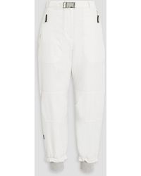 Brunello Cucinelli - Cropped Bead-embellished Padded Shell Tapered Pants - Lyst