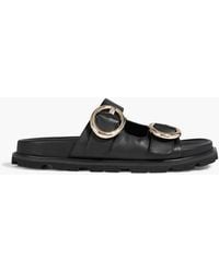 Stuart Weitzman - Benni Buckled Leather Sandals - Lyst