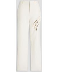 Area - Claw Embellished Cutout Crepe Tapered Pants - Lyst