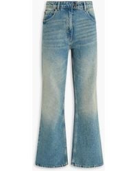 Courreges - Hoch sitzende bootcut-jeans in ausgewaschener optik - Lyst
