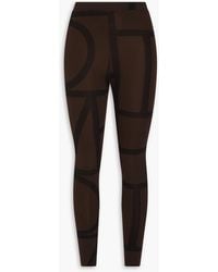 TOTEME - Logo-Print Stretch-Jersey Leggings - Lyst