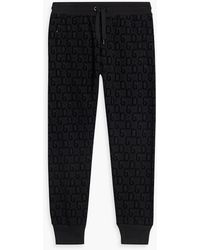 Dolce & Gabbana - Flocked French Cotton-blend Terry Sweatpants - Lyst