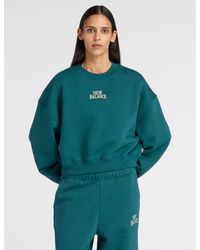 New Balance - Women's Trackside Fleece Crew - Lyst