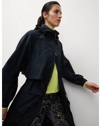 GOODMOVE - Women's Stormwear Lightweight Packable Hooded Parka - Lyst