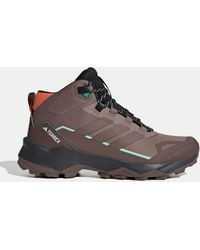 adidas - Women's Terrex Skychaser Ax5 Mid Gore-tex Hiking Shoes - Lyst