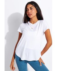 Beyond Yoga - Women's On The Down Low Tee - Lyst