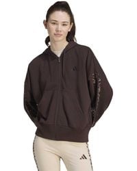 adidas - Women's Seasonal Essentials Animal Print 3-stripes Full-zip Hooded Track Top - Lyst