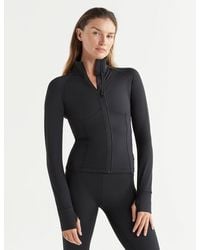 Lilybod - Women's Zuri Contoured Zip Thru Top - Lyst