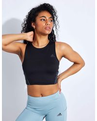 adidas Sleeveless and tank tops for Women | Online Sale up to 83% off | Lyst