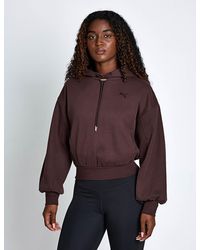 PUMA - Women's Her Relaxed Fleece Hoodie - Lyst