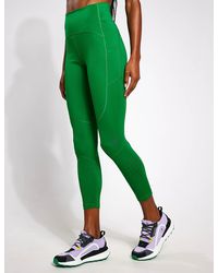 adidas By Stella McCartney True Strength Recycled Tech leggings in Black/Yellow Green Womens Trousers Slacks and Chinos Slacks and Chinos adidas By Stella McCartney Trousers 