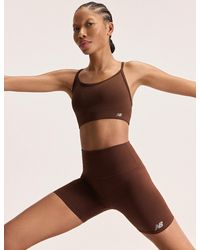 New Balance - Women's Nb Essential Yoga Sports Bra - Lyst
