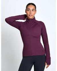 Lilybod - Women's Zuri Contoured Zip Thru Top - Lyst