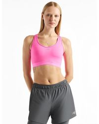 New Balance - Women's Nb Essential Run Sports Bra - Lyst
