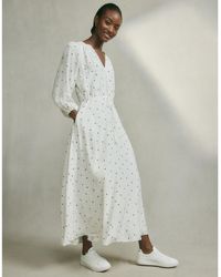 The White Company - Border Print Smocked Detail Dress - Lyst