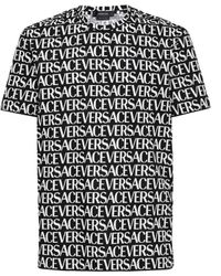 Versace - T Shirt Logata All Over - Lyst