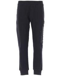 McQueen - Pantaloni in cotone con logo - Lyst