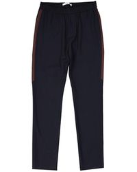Givenchy - Pantaloni in lana con pannello laterale a righe - Lyst