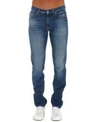 Versace - Baumwolle Logo Denim Jeans - Lyst