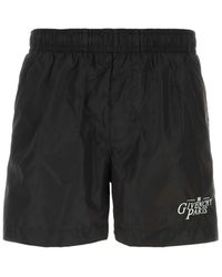 Givenchy - Logo-Embroidered Swim Shorts - Lyst