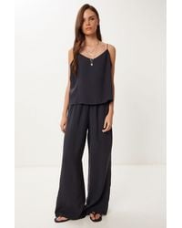 Happiness İstanbul - V-Neck Sleeveless Two-Piece Coord Set With Wide Leg Pants - Lyst