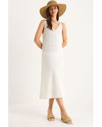 Bianco Lucci - Textured V-Neck Midi Knit Dress With Back Print - Lyst