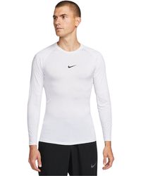 Nike - Pro Dri-Fit Strakke Fitnesstop Met Lange Mouwen Voor - Lyst