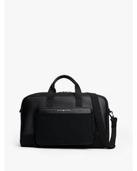 Tommy Hilfiger - Crossbody-Dufflebag Mit Logo Aus Metall - Lyst