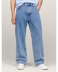 Tommy Hilfiger - Aiden Dad Baggy Mid Wash Jeans - Lyst