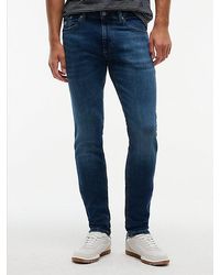 Tommy Hilfiger - Austin Whiskered Slim Tapered Leg Jeans - Lyst
