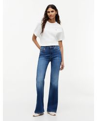 Tommy Hilfiger - Whiskered Mid Rise Flared Jeans - Lyst