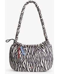 Tommy Hilfiger - Zebra Print Multi Charm Hobo Bag - Lyst