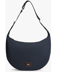 Tommy Hilfiger - Heritage Logo Patch Slouch Crossbody Bag - Lyst