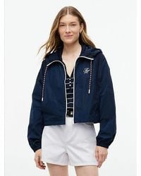 Tommy Hilfiger - Waterafstotende Windbreaker Met Capuchon En Logo - Lyst