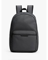 Tommy Hilfiger - Rucksack Mit Gleichfarbigem Logo Aus Metall - Lyst