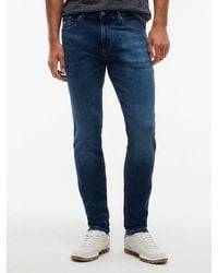 Tommy Hilfiger - Austin Whiskered Slim Tapered Leg Jeans - Lyst