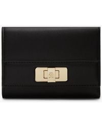 Tommy Hilfiger - Modern Th Monogram Turn Lock Trifold Wallet - Lyst