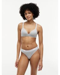 Tommy Hilfiger - Repeat Logo Lightly Lined Triangle Bra - Lyst