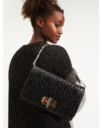 Tommy Hilfiger Leren Clutch Met Turnlock - Zwart