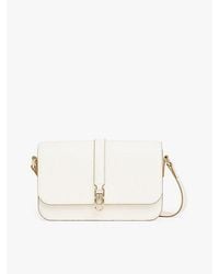 Tommy Hilfiger - Crossbody-Tasche Mit Klappe Und Th-Monogramm - Lyst
