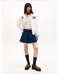 Tommy Hilfiger - Tonal Logo Appliqué Pleated Mini Skirt - Lyst