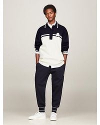 Tommy Hilfiger - Relaxed Fit Polopullover mit Wappen - Lyst