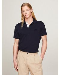 Tommy Hilfiger - Regular Fit Poloshirt mit Kontrast-Knöpfen - Lyst