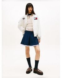 Tommy Hilfiger - Tonal Logo Appliqué Pleated Mini Skirt - Lyst