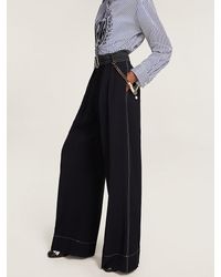 Tommy Hilfiger Wide Flare Chino Met Geborduurd Embleem - Paars