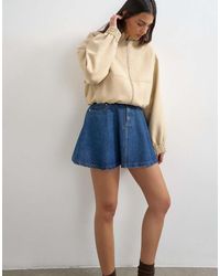 TOPSHOP - Denim Pleated Full Mini Skirt - Lyst